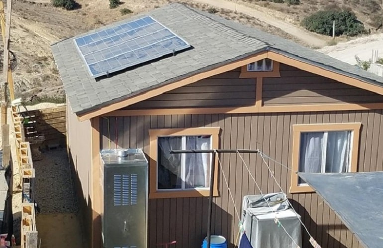 Photo 2. The used service life PV-panel on the roof of a house in Mexico provides free electricity for residents. Owned by WFTSS. Source: online edition Solar Power World - Old solar panels get second life in repurposing and recycling markets, Jan'19